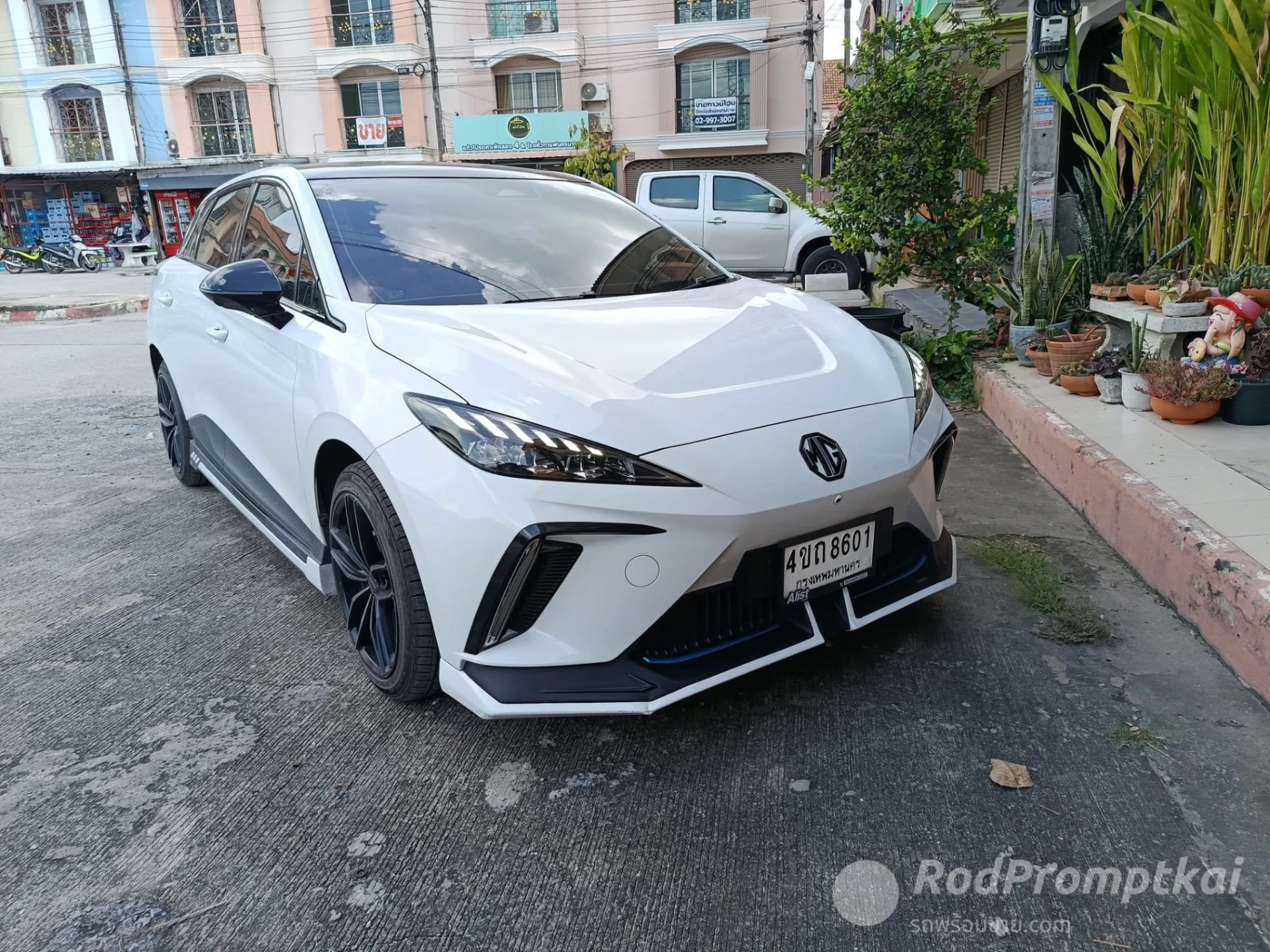 MG